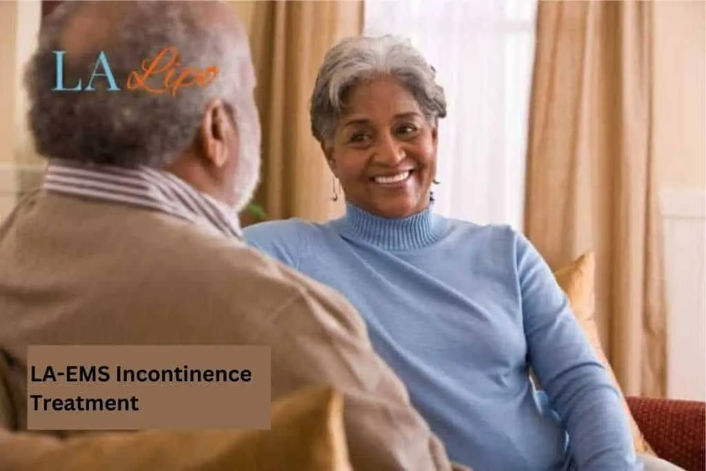 Couple sat smiling at each other - LA-EMS treatment South Woodford