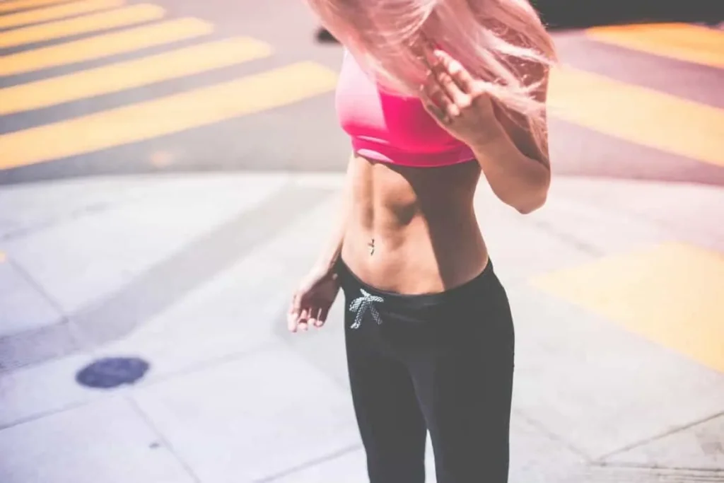 Woman with toned stomach after LA-EMS Body Sculpting Treatment South Woodford
